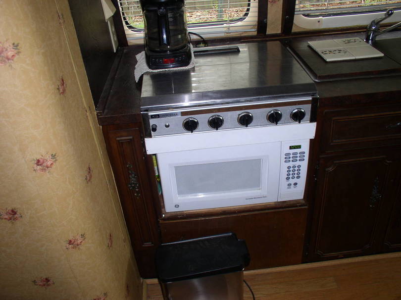 Range and microwave.  Furnace is below microwave