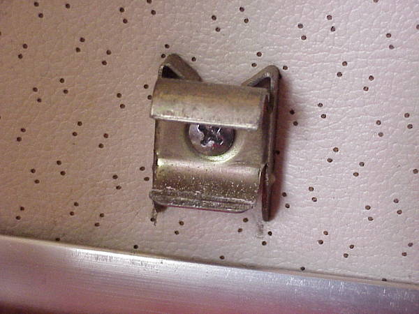 drapery rod holder