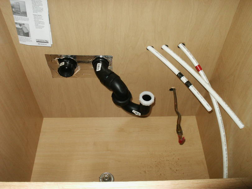 Right cabinet with plumbing