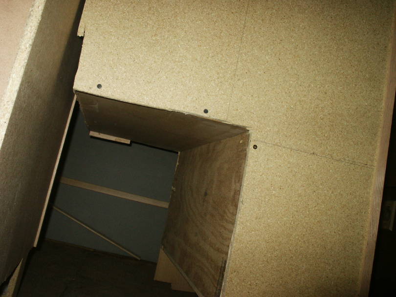 Back of left cabinet showing Wheelwel cutout.