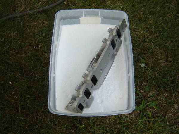 Give the new manifold a bath before installation.