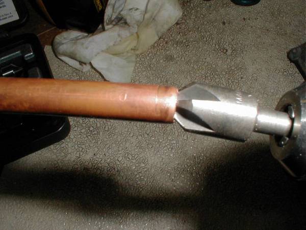 I find a countersink the best way to deburr tubing.