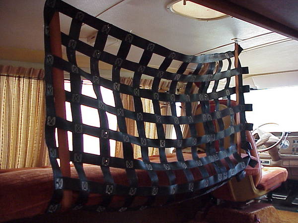 weaving a tailgate net in place