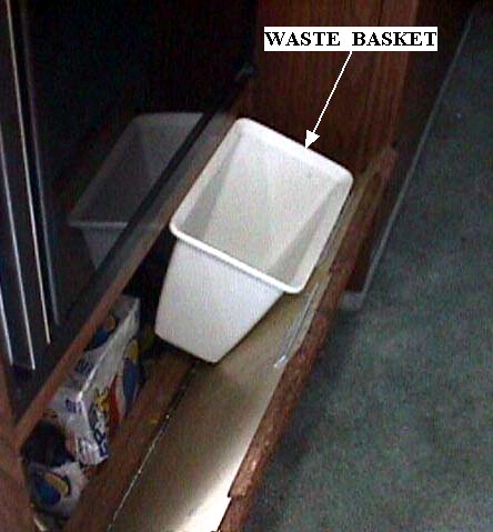 Trash container in place