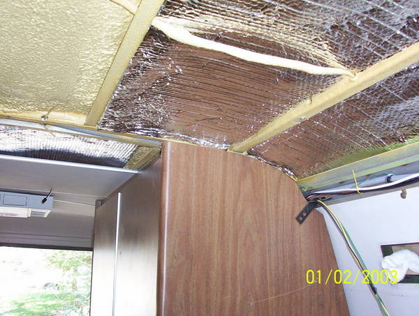 Insulation in place between overhead ribs.