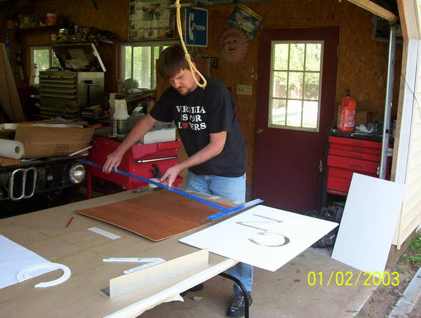 Son-in-law working new door panel.