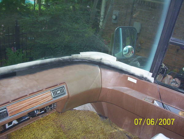 Window taped and trim paint in place.