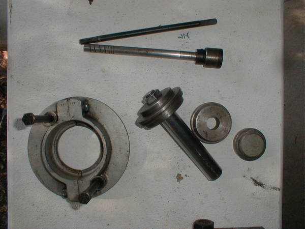 Top - Oil Pump Driver,  L. - Front Wheel Bearing Puller, R - Seal Driver