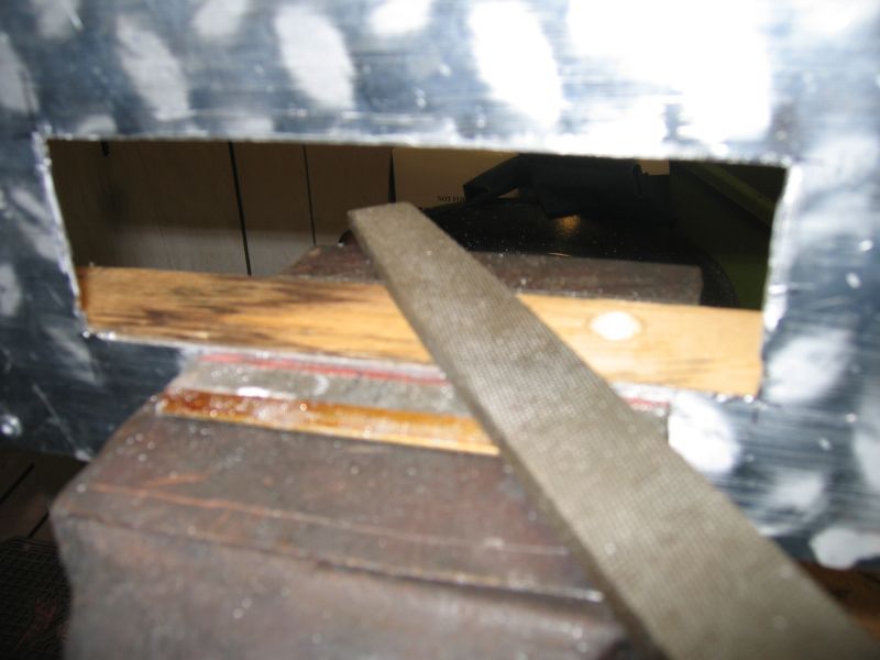 Cutting the radio opening in the center console panel