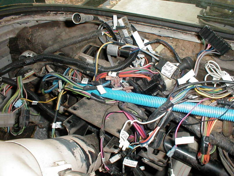 Unbolting the steering column makes dash removal possible.