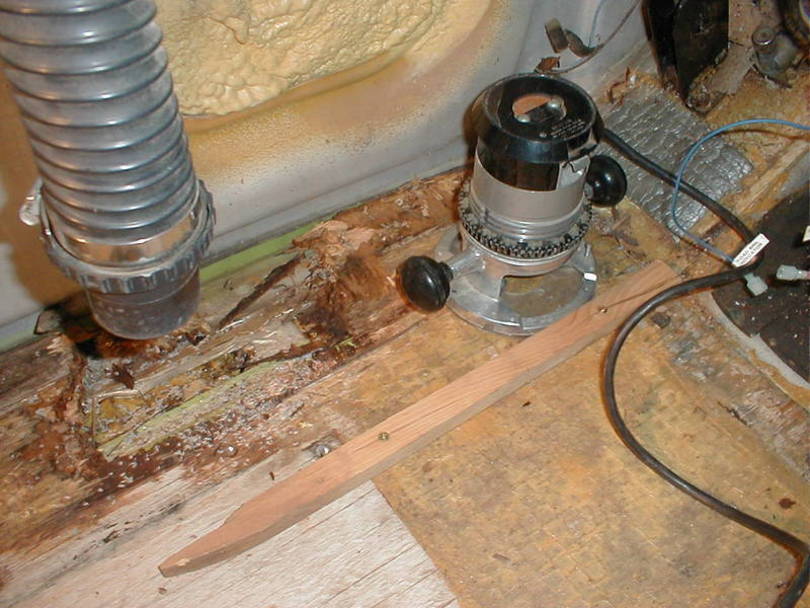 Cutting out &amp; cleaning up the rotten wood.