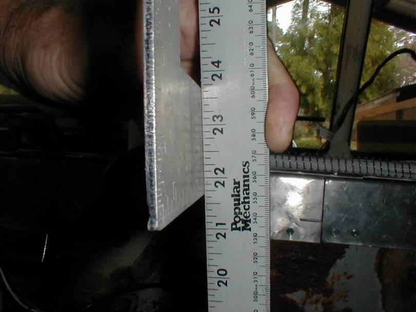 Measuring the height of the dash above the engine hatch.