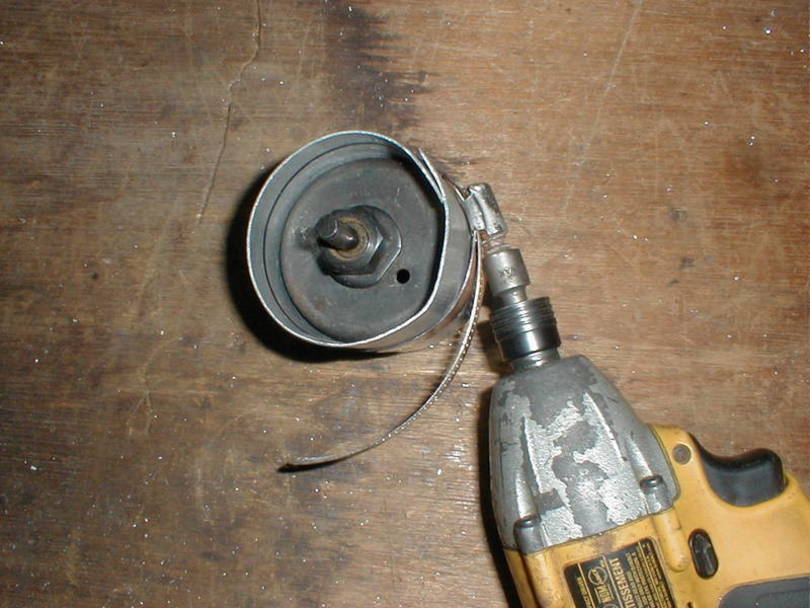 The aviation hose clamp squeezes the aluminum into shape.