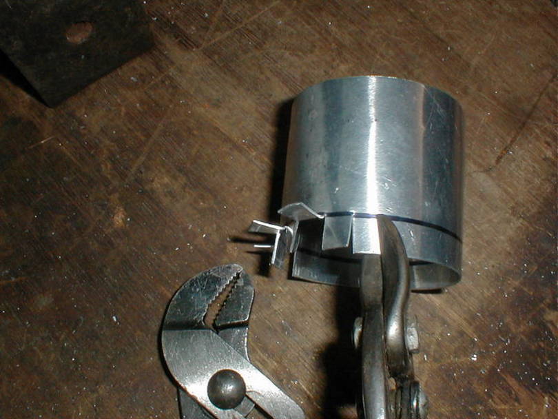 Self-formed tabs are used to hold the connector to the duct.