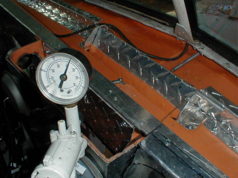 10" Hg is sufficient to operate the new doors even with added springs.