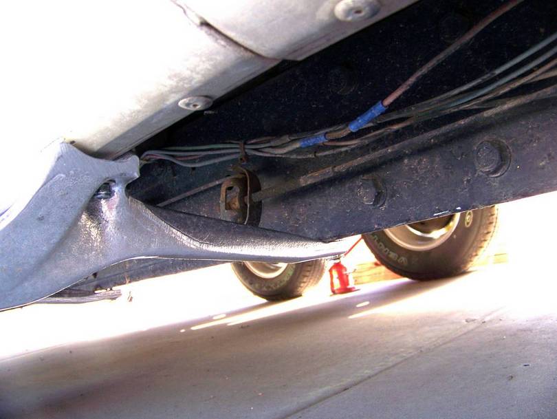 Under side of Coach Frame Rails and Insulators