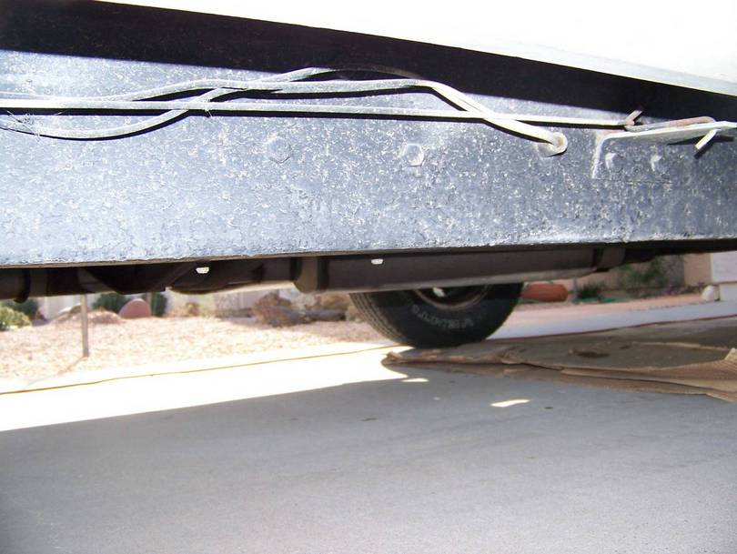Under side of Coach Frame Rails and Insulators