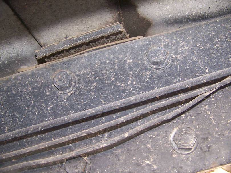 Under side of Coach Frame Rails and Insulators