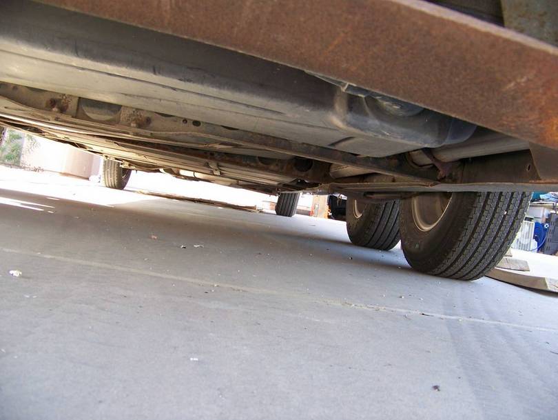 Under side of Coach Frame Rails and Insulators