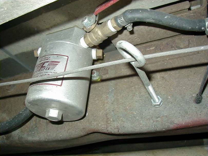 OUtside frame large fuel filter.