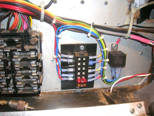 Fuse and wiring additions to main coach fuse panel.