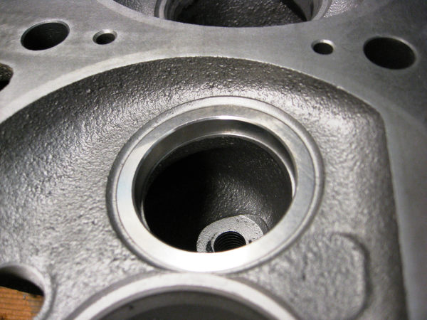 J head exhaust valve insert