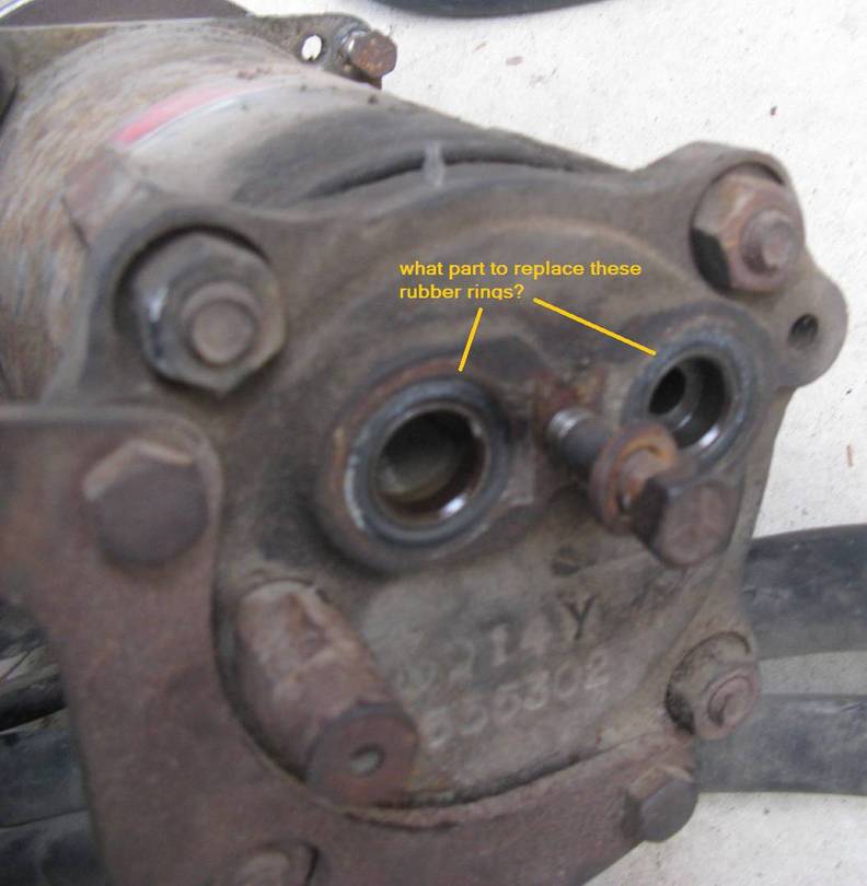 rubber rings on the back of the ac compressor where the refrigerant hoses m