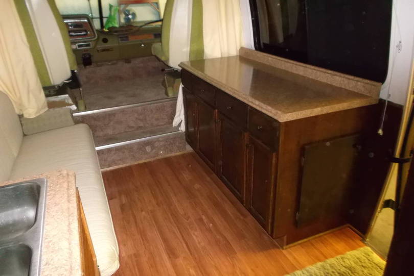 WE DON'T USE A DINETTE, BUT NEEDED MORE COUNTER AND CABINETS