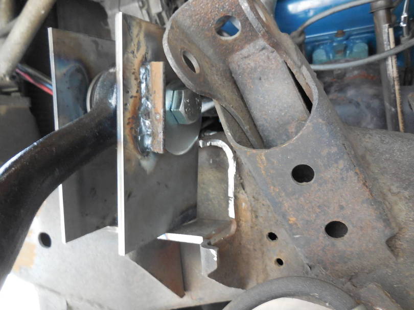Upper control arm relocation