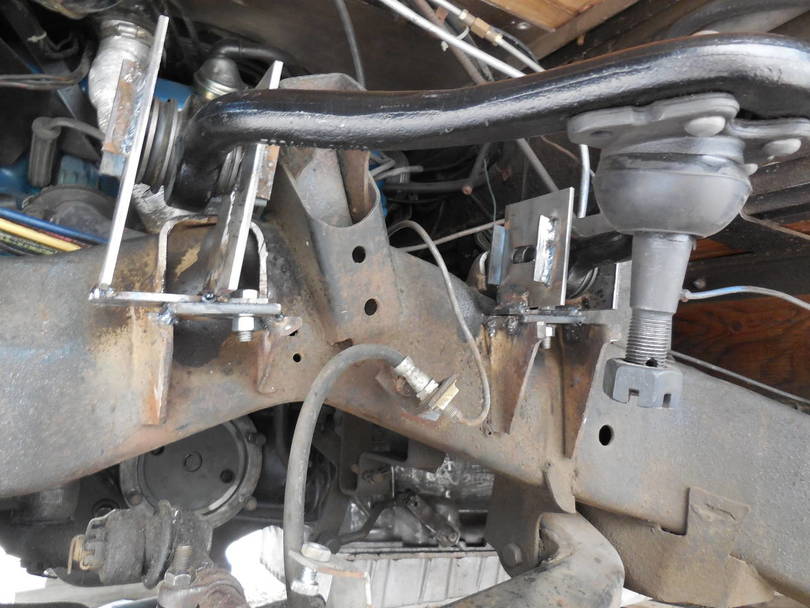 Upper control arm relocation