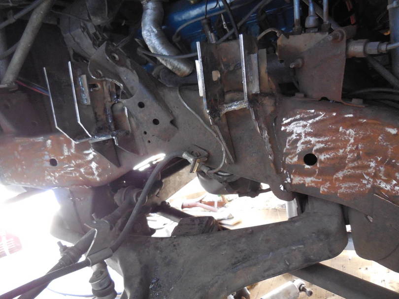 Upper control arm relocation