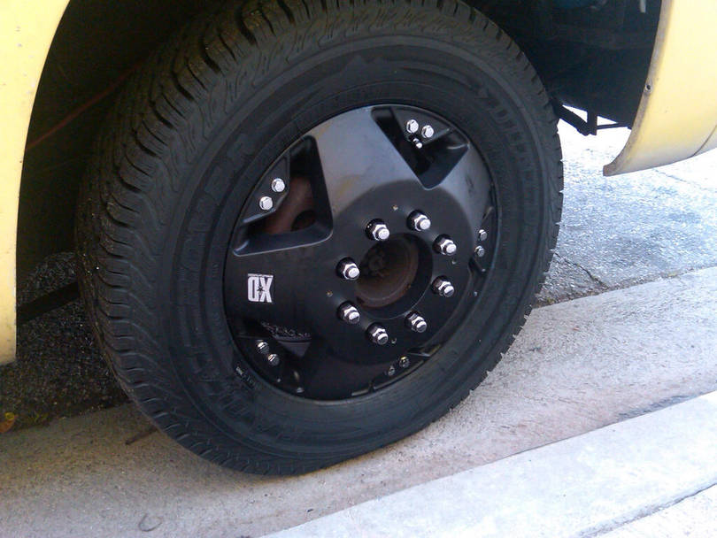 closeup of the front pax side wheel without star cap