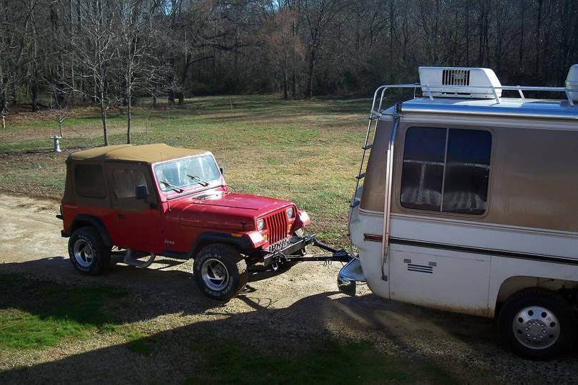 GMC towing jeep