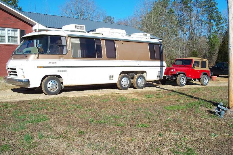 GMC towing jeep