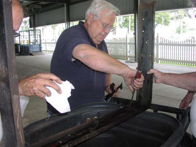 Working on and cleaning the radiator frame