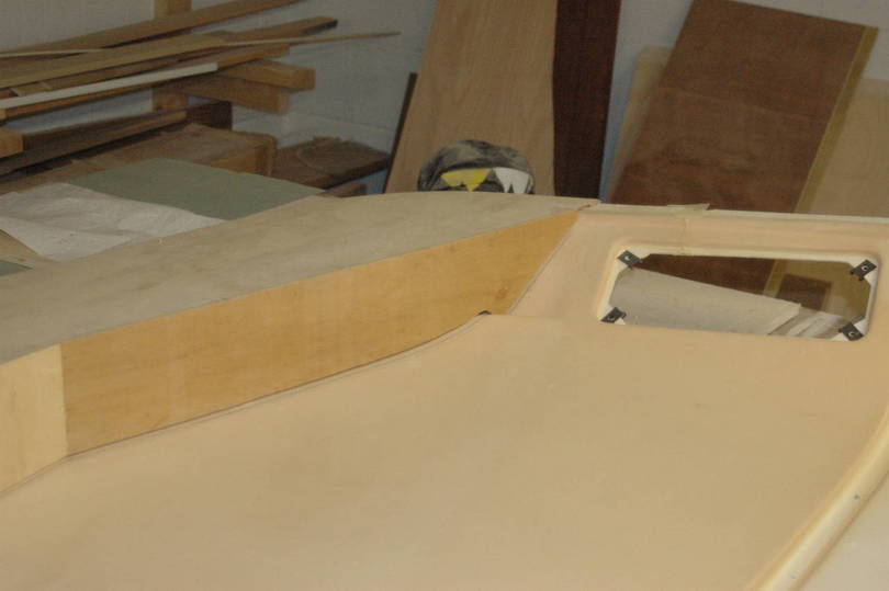 Upper front console mold plug in process