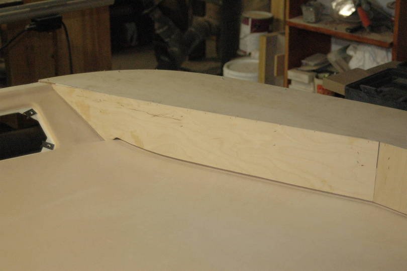Upper front console mold plug in process