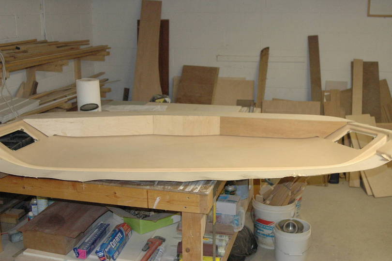 Upper front console mold plug in process