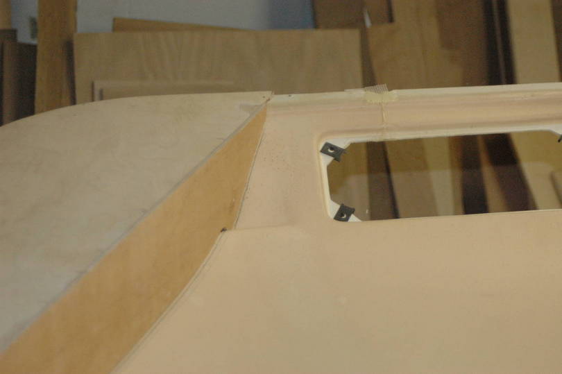 Upper front console mold plug in process