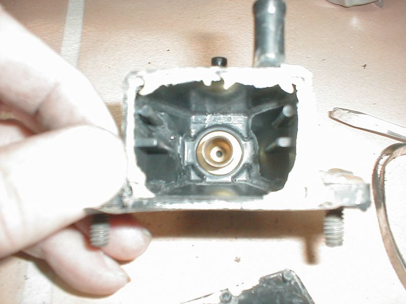 The needle valve seat is brass.