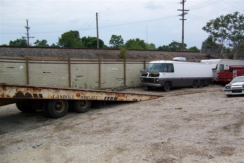 Getting ready to pull Transmode onto Landoll trailer.