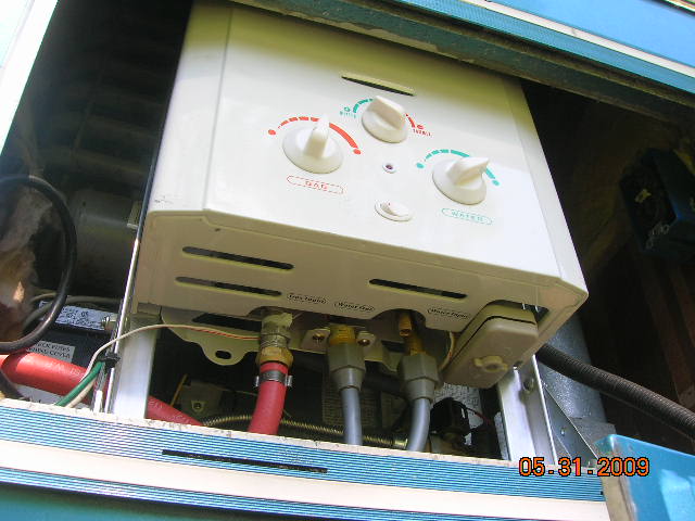 Rays Tankless Water Heater Installation Behind Refrigerator