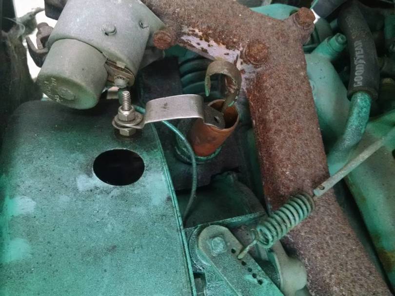 Onan dipstick hold down