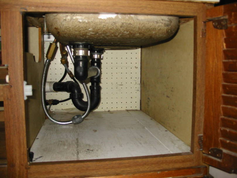Below sink storage, sink has been rotated 90 deg. for more counter space.