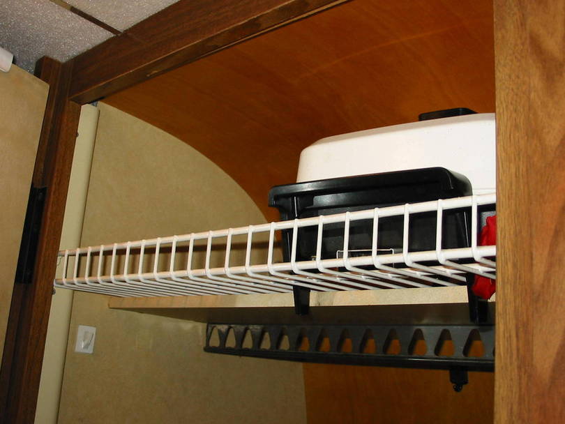 Wire rack extends usable space.