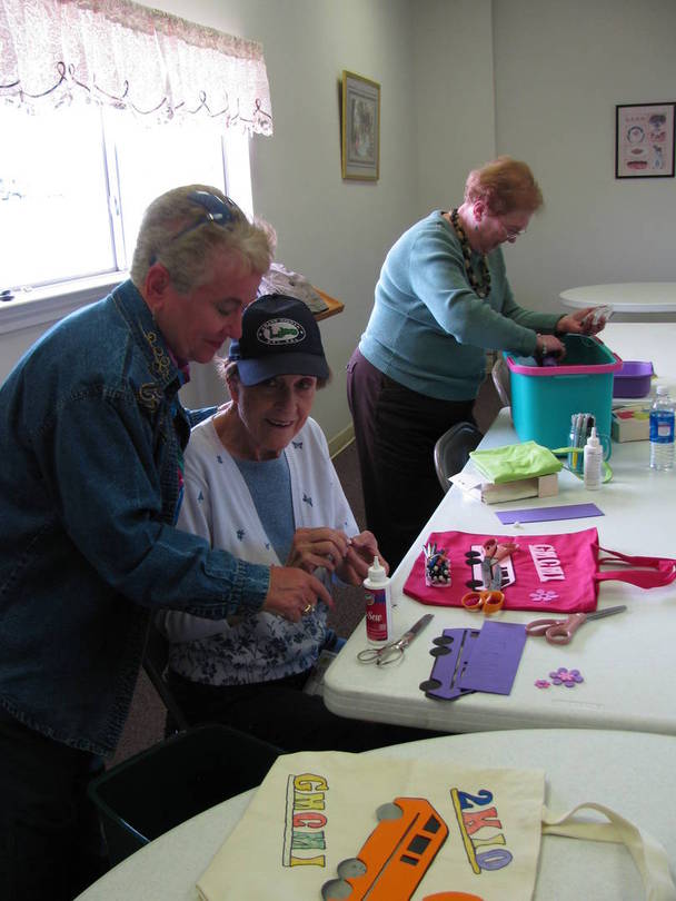 Billie Young helping Lucille Skipper