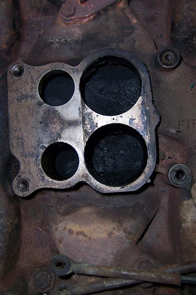 Carbon deposits in intake bores.