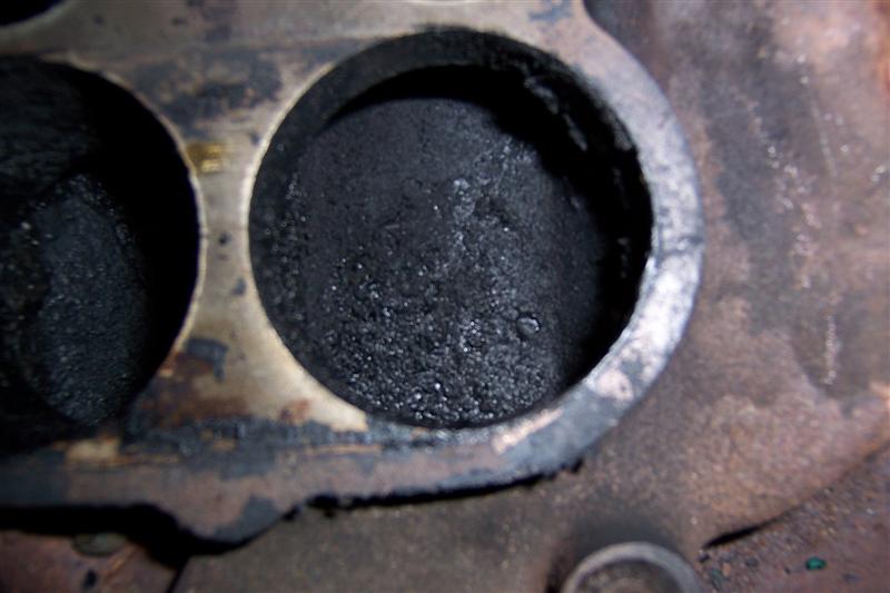 Carbon deposits in intake bores.