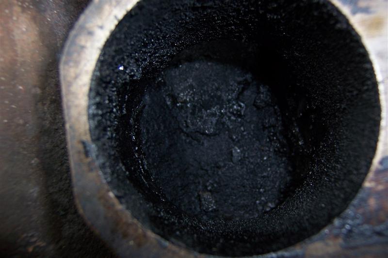Carbon deposits in intake bores.