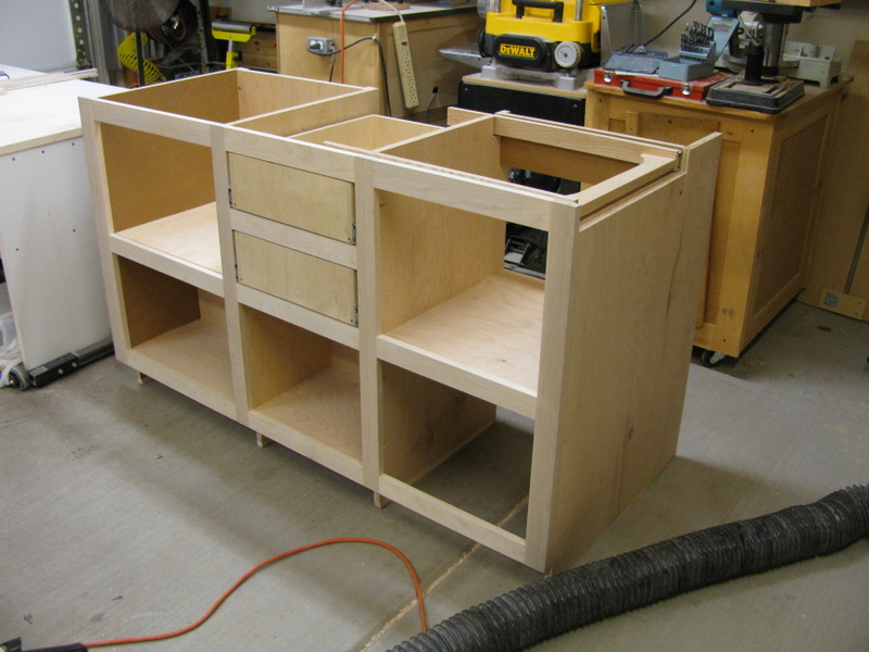 Kitchen base cabinet with drawers and counter extension